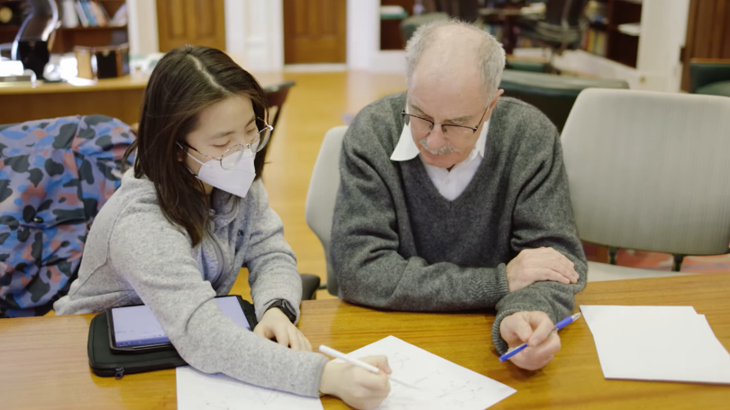 Phil Hanlon with student during office hours